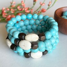 Turquoise Love Bracelet, Meditation Yoga Bracelet, Spiritual Energy Healing, Mala Beads Chakra Bracelet, Visualization Bracelet, True Healing Source This chunky turquoise (magnesite) Universal Love bracelet is handmade with 10mm turquoise magnesite stones, white magnesite stones and dark brown wood beads on elastic cord.  This listing is for one bracelet. CHOOSING YOUR BRACELET SIZE: For a comfortable fit I recommend choosing the size bracelet that is about 1/2 inch larger than your actual wrist Bohemian Turquoise Howlite Bracelets, Turquoise Beaded Howlite Bracelets, Turquoise Beaded Bracelets With 8mm Beads For Beach, Turquoise Wrap Bracelet With Round Beads As Gift, Spiritual Turquoise Wrap Bracelet With Round Beads, Turquoise Spiritual Wrap Bracelet With Round Beads, Turquoise Howlite Beaded Bracelets, Turquoise Jewelry With 8mm Beads For The Beach, Bohemian Howlite Gemstone Beads Bracelets