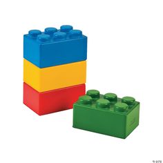 two lego blocks sitting next to each other on a white background, one with green top and the other with yellow bottom