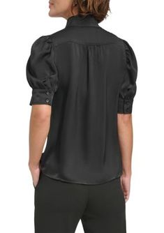 Chic puff sleeves bring a hint of drama to this blouse from DKNY. | DKNY Women's Puff Sleeve Mandarin Collared Blouse, Black, Large Night Out Puff Sleeve Blouse, Black Puff Sleeve Blouse For Office, Fitted Black Puff Sleeve Top With Blouson Sleeves, Formal Puff Sleeve Top, Black Blouse With Blouson Lantern Sleeves, Elegant Black Puff Sleeve Top For Workwear, Black Padded Puff Sleeve Top, Black Tops With Puff Blouson Sleeves, Elegant Black Puff Sleeve Top