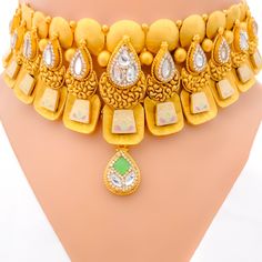 This choker set is a masterpiece in 22k gold with an antique finish, weighing a substantial 80.4 grams. It features timeless Kundan stones and is designed with a length of 13.5 inches and a width of 1.5 inches, creating a striking profile. The necklace includes a 0.75-inch drop, enhancing its traditional appeal, and comes with 1 inch of adjustable links secured by a hook lock for a perfect fit. Matching earrings, each 2.25 inches in length with secure screw-back posts, complete the ensemble. Thi Designer Gold Necklace For Festive Occasions, Designer Kundan Gold Necklace, Designer Kundan Gold Necklaces, Designer Gold Kundan Necklace, Designer Gold Kundan Necklace For Gift, Designer Gold Necklaces For Festive Season, Designer Gold Kundan Necklace For Festive Occasions, Festive Designer Gold Kundan Necklace, Designer Gold Jewelry With Meenakari