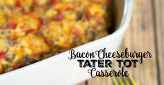 bacon cheeseburger tater tot casserole in a white dish with a fork