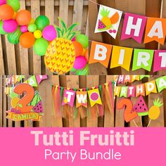 there is a birthday banner and decorations on the wall with words that read happy birthday tutti frutti party bundle