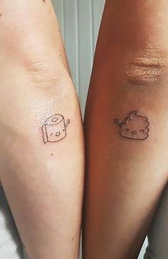 two people with matching tattoos on their legs