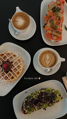 four plates with different types of food on them and two cups of cappuccino