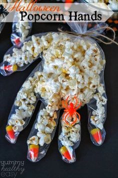 a bag filled with popcorn sitting on top of a table