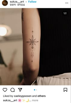 a woman's arm with a star tattoo on the left side of her arm