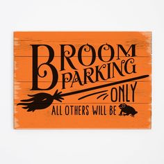 a wooden sign that says broom parking only all others will be