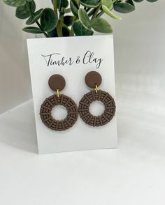 These earrings are a beautiful brown color with a rattan design. They are very lightweight and comfortable to wear all day! Add a subtle statement to your look with these Round Rattan Dangles. Handcrafted with lightweight polymer clay, the round shape ensures a perfect fit with any outfit. Hypoallergenic and high quality materials. The earring cards are 3” tall and 2.5” wide for size reference. Rattan Design, Earring Cards, Hair Barrettes, Round Shape, Brown Color, Polymer Clay, Perfect Fit, High Quality, Color