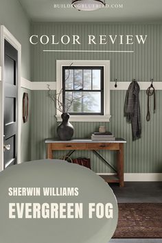 the front cover of color review magazine showing a green room with white trim and wood floors