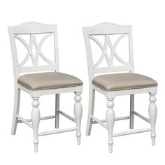 pair of white wooden chairs with beige upholstered seat cushions on the back and sides