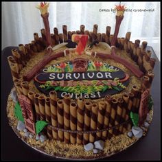 a cake that is made to look like a survivor on the great escape theme park