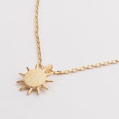 Crafted with precision, this Everyday Wear Sun Pendant Necklace is an essential addition to any jewelry collection. Made for everyday wear, this necklace features a beautiful sun pedant that adds a touch of warmth and glow to any outfit. Perfect for any occasion, this necklace is a must-have for any fashion-forward individual. Approx. 16 inch Everyday Sun Design Pendant Necklace, Silver Sunburst Necklace For Gift, Sun And Moon Design Necklace As A Gift, Dainty Sun Design Necklace For Everyday, Dainty Everyday Necklaces With Sun Design, Everyday Sun-shaped Jewelry With Sun Design, Sun Design Pendant Necklace Gift, Sun Design Charm Necklace Gift, Everyday Sun Design Jewelry