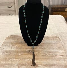 Vintage Southwestern Gold Tone Bronze Faux Turquoise Beaded Tassel Pendant Statement Necklace. In excellent condition. Total length unclasped and lying flat is 32" Adjustable Turquoise Tassel Necklace With Round Beads, Turquoise Beaded Necklace With Tassels And Round Beads, Turquoise Beaded Necklace With Tassels, Turquoise Beaded Tassel Necklace With Round Beads, Turquoise Necklaces With Tassel And Round Beads, Adjustable Turquoise Tassel Necklaces, Turquoise Beaded Tassel Necklace For Festival, Turquoise Necklace With Tassels And Round Beads, Turquoise Beaded Tassel Necklace