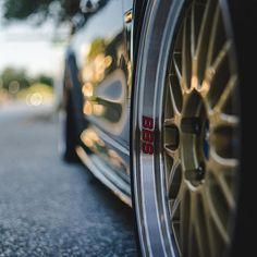 a close up of a car tire on the street