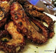 grilled chicken wings with sauce and herbs