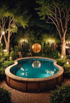 a swimming pool surrounded by trees and lights