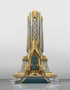 a gold and silver clock tower sitting on top of a table