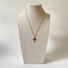 This little garnet cross is set in 900 silver with gold vermeil, with 18 natural garnet stones measuring approximately 2 mm each. The cross itself measures approximately 22.5 mm in length, and 17.5 mm in width, not including jump ring. The item listed here is old stock from a defunct jewelry business. Great condition unless otherwise noted. Please keep in mind that computer monitors vary & I do my best to provide an accurate representation of the colors of the items listed. Please note chain Gold Plated Cross Pendant Necklace Spiritual Style, Gold Plated Cross Pendant Necklace With Spiritual Style, Spiritual Gold Plated Cross Pendant Necklace, Yellow Gold Brass Cross Pendant Necklace, Yellow Gold Brass Necklace With Cross Pendant, Gold Cross Charm Necklace Spiritual Style, Gold Cross Charm Necklace For Spiritual Style, Yellow Gold Cross Charm Necklace With Adjustable Chain, Gold Plated Cross Pendant Necklace