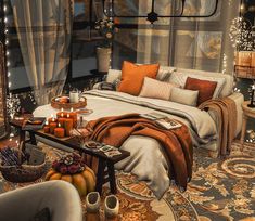 a bedroom decorated for fall with candles and blankets