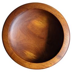 a wooden bowl is shown on a white background