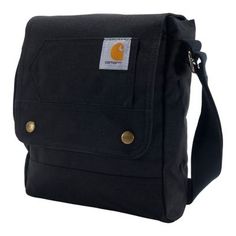 Conquer the day with the Carhartt Legacy Snap Crossbody Bag, the bag that's built strong like you. From work to home and everywhere in between, this bag keeps your hands free to tackle anything that comes your way. It has a large main compartment and a 15 in. laptop sleeve for convenient storage. The bag's water-repellent finish and Carhartt logo complete the design. Perfect companion when extra essentials are needed with you on the go, quick access with easy-access flap Ultra tough 600-denier p Snap Bag, Carhartt Logo, Carhartt Womens, Work Bags, Carry All Bag, Everyday Items, Everyday Bag, Black Cross Body Bag, Good Brands