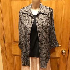 The gray and black blouse is 1 piece but looks like a 2 piece size L/16 blouse that measures about 21 inches across the back underarm seam-to-seam, 26-1/4 inches long, 18 inches long sleeve. It is from Dressbarn and worn very little so it in very good condition, clean and from a non-smoking home. 📣 For more apparel and clothes take a moment to browse the "Apparel.Clothes" at https://www.etsy.com/shop/SharonsWorld?section_id=12309605. 📣 Also, please take a moment to look at our other vintage items in our Etsy shop at SharonsWorld.etsy.com 📣 I try to provide accurate descriptions along with photos, that are an integral part of the description, but please ask any questions you may have before purchasing as item is offered no return, no refund. 📦📦 SHIPPING: 🪧 SharonsWorld will never inte Gray Formal Tops For Fall, Gray Fitted Top For Formal Occasions, Spring Gray Collared Blouse, Gray Collared Blouse For Spring, Gray Fitted Formal Tops, Spring Collared Gray Blouse, Elegant Gray Top With Button Closure, Formal Gray Button-up Top, Grey Blouse