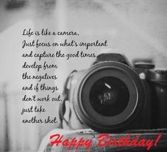 a camera sitting on top of a table next to a happy birthday card with the words, life is like a camera just focus on what important and capture the good times