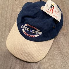 Never Been Worn! Navy Casual Baseball Cap With Short Brim, Casual Blue Brimmed Hat, Country Style Blue Hat, Navy Casual Cap, Blue Country Style Hat, Navy Casual Visor Hat, Blue Vintage Baseball Cap For The Beach, Vintage Blue Baseball Dad Hat, Vintage Cotton Baseball Cap With Logo Patch