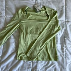 H&M Long Sleeve Top, Never Worn Green Cotton H&m Tops, H&m Green Tops For Spring, H&m Green Tops For Fall, Casual Spring Tops By H&m, H&m Tops For Spring Day Out, H&m Long Sleeve Solid Color Top, H&m Cotton Tops For Spring, H&m Spring Stretch Tops, H&m Stretch Tops For Spring