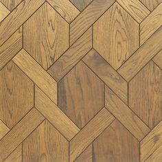 an image of wood flooring that looks like hexagonal tiles or herringbones