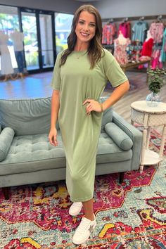 Everyone needs at least one color of our AMIRA T-Shirt Midi Dress! It is perfect to dress up or dress down. You cannot go wrong with its stretchy, breathable material and its level of comfort is unmatched! It runs true to size with a good bit of stretch. Model is wearing a small. Wash separately. Hang to dry. No bleach. Material: 82% Modal, 18% Polyester Small 2/4 Medium 6/8 Large 10/12 Casual Green Stretch Dresses, Casual Solid Color T-shirt Dress For Loungewear, Green Cotton Casual T-shirt Dress, Spring Green Cotton T-shirt Dress, Casual Stretch Dresses For Loungewear, Casual Stretch Loungewear Dresses, Casual Olive Cotton Dress, Casual Solid Dresses For Everyday, Casual Solid Everyday Dress