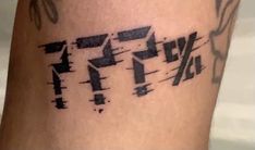 a close up of a person's leg with numbers on it and arrows in the background