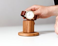 Watch stand When you buy an expensive and beautiful watch, you must immediately take care of its proper and careful storage and safety. To do this, we created our wooden stand, which allows the watch to be in the correct position, the strap to keep its shape, and the dial glass not to be scratched. Our watch stand is a stylish accessory and an excellent addition to the unusual design of any room. It is suitable for both modern smartwatches, such as Apple Watch and regular models with a steel or Wooden Watch Stand, Watch Stand, Watch Storage, Hexagon Design, Wooden Watch, Unusual Design, Wooden Stand, Beautiful Watches, Desk Organization