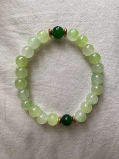 Super stretchy, made to fit any wrist! Jade Stretch Bracelet With Natural Stones, Casual Green Agate Bracelets, Casual Green Agate Bracelet, Hand-strung Jade Stretch Bracelet For Healing, Elegant Hand-strung Jade Stretch Bracelet, Casual Green Beaded Bracelets With Natural Stones, Elegant Green Stretch Bracelet With Round Beads, Elegant Jade Stretch Bracelet, Adjustable Green Stretch Bracelet With Natural Stones