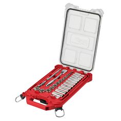 a red tool box filled with tools on top of a white background