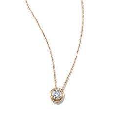 This sparkling round lab-grown diamond pendant features a stylish bezel setting. Crafted in warm 14-karat yellow gold  a matching cable chain with a lobster clasp keeps this necklace secure. Classic Gold Solitaire Necklace With Smooth Bezel, Anniversary Diamond Necklace With Smooth Bezel, Gold Diamond Solitaire Necklace With Smooth Bezel, Classic Round Diamond Necklace With Smooth Bezel, Classic Round Solitaire Necklace With Smooth Bezel, Anniversary Round Cut Diamond Necklace With Smooth Bezel, Yellow Gold Necklace With Smooth Bezel And Round Shape, Yellow Gold Necklace With Smooth Bezel, Classic Round Necklace With Smooth Bezel