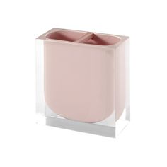 a pink vase sitting on top of a glass block in front of a white background