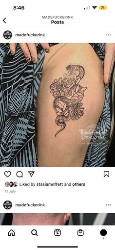 an image of a woman's thigh with flowers on it