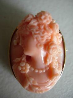 Stunning Victorian CameoThis is one of the best coral cameos you will ever see. Its victorian and set in 14kt yellow gold frame. The cameo is carved in great relief with flowers, drapes and swags. C Fashion, Black Pinterest, Victorian Cameo, Owl Earrings, Cameo Jewelry, Summer Street, Vintage Cameo, Spring Jewelry, Gold Border