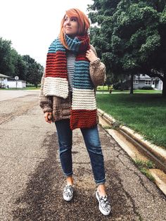 Stay warm - but keep it fashion. Our Stripe Up Your Life Scarf will help you do just that! This is a hand-knitted long, oblong style scarf with many ways to wear! With a length of 84" you can wrap it once or twice depending on your own height! Spiced Skies features colors Burnt Orange, Sky, and Winter White! Fiber Content: 100% merino wool Why Luxury? The Nickichicki Luxury Line features clothing and accessories hand-knit in 100% natural fiber yarns; typically either merino wool or Peruvian high Fall Knit Infinity Scarf, Knit Scarves For Fall Cold Weather, One Size Knit Scarves For Fall, Knit Scarves One Size For Fall, One Size Knit Scarves, Knit Scarf For Cold Weather And Fall, Knit Scarf For Fall Cold Weather, Knit Scarf For Fall And Cold Weather, Fall Knit Scarf For Cold Weather