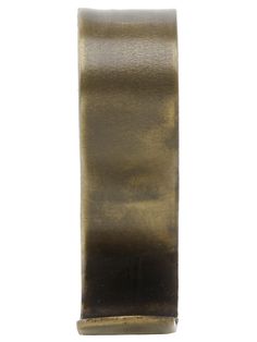 a roll of metallic tape on a white background