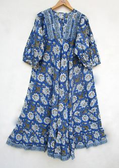 ITEM DESCRIPTION cotton royal blues printed long maxi dress - Henley neckline with buttons summer maxi dress  - 3/4th sleeve with button dress Features: 3/4th sleeve, Henley neck, Long dress Fabric : 100% Cotton cambric hand block print fabrics   Sleeve Length = 18 inch For more sizes & their measurement, please refer our below chart to understand the sizes variations available with us For your size requirement, please mention your size in seller note at the time of buying. SIZE MEASUREMENT  BUSTLENGTHSHOULDER XXS34 inch51 inch13.5 inch XS36 inch51 inch14 inch S38 inch51 inch14.5 inch M40 inch51 inch15 inch L42 inch51 inch16 inch XL44 inch51 inch16.5 inch 2XL46 inch51 inch17 inch 3XL48 inch51 inch18 inch   Company Return Policy:  Please write for more information to my email directly CHOOS Button Maxi Dress, Ethnic Print, Maxi Robes, Blue Hand, Block Printing Fabric, Button Dress, Summer Maxi Dress, Long Maxi, Long Maxi Dress