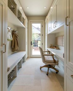 an instagram photo of a home office with built - in desks and cabinets