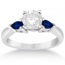 a diamond and blue sapphire engagement ring