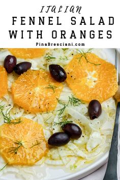 an orange and fennel salad with oranges on a white plate next to a fork