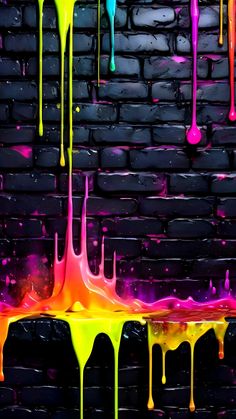 multicolored dripping paint against a brick wall