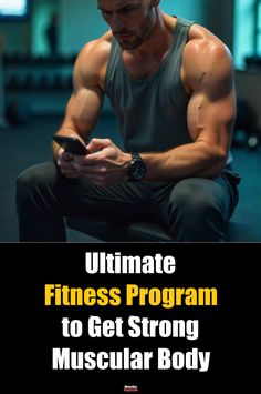 a man sitting on the ground looking at his cell phone and texting ultimate fitness program to get strong muscular body