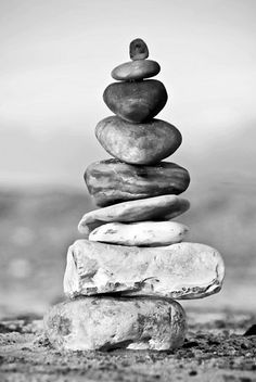 black and white photograph of rocks stacked on top of each other