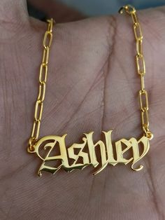 Get your unique and eye-catching✨ Personalized Name Necklace now. Available in 10+ font styles and 5 different styles of chains. Wear a name necklace is a great way to add a burst of uniqueness and personality. With the Personalized Name Necklace beautifully packaged in a gift box, 🎁 it also makes it a thoughtful and memorable gift for loved ones on special occasions such as Valentine's day, Christmas, Mother's Day, or Thanksgiving. 💍Our Custom Name Necklaces are made of the highest quality br Custom Gold Nameplate Jewelry, Gold Name Bracelet In Letter Shape For Gift, Custom Gold Name Jewelry, Customizable Gold Pendant Necklace, Customizable Nameplate Charm Necklaces, Custom Gold Jewelry With Name, Customized Yellow Gold Charm Necklaces For Personalized Gifts, Custom Gold Jewelry With Custom Name, Customizable Nameplate Necklace For Birthday