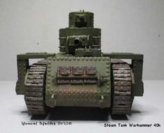 a toy tank is sitting on a white surface with it's front end missing